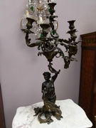 A gilded and patinated bronze candelabra by Pandiani a Milano.
