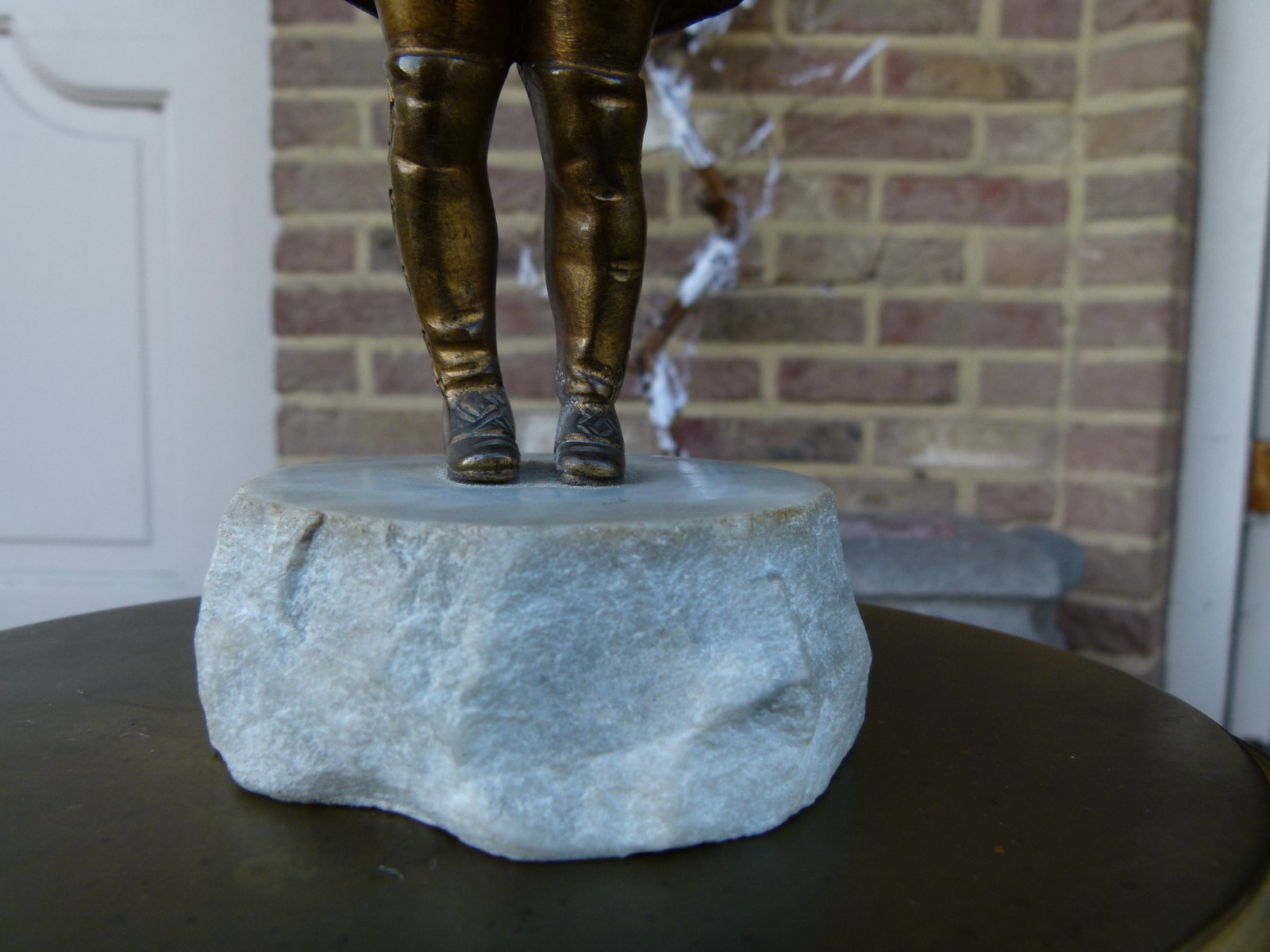 sculpture by G.Omert child with doll