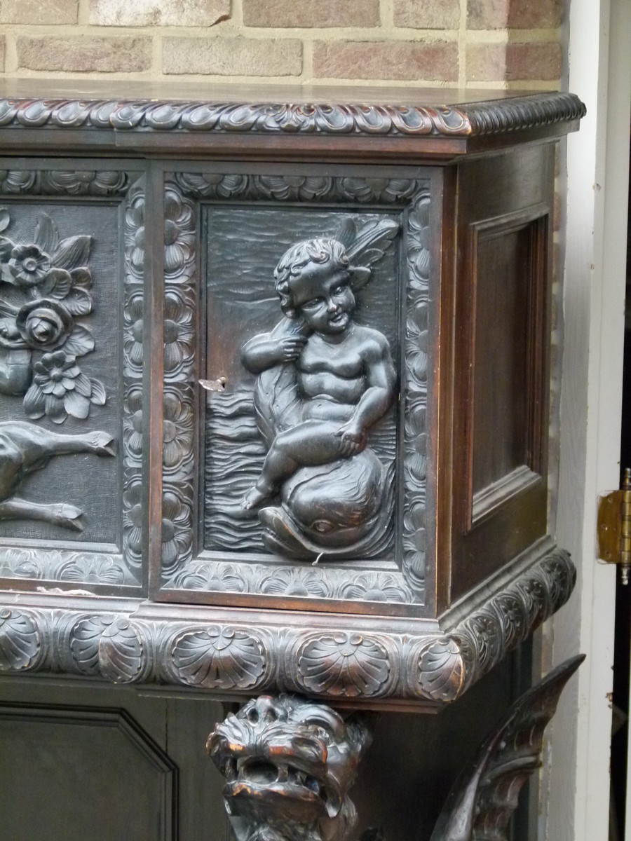 Barock Highly carved credence cabinet