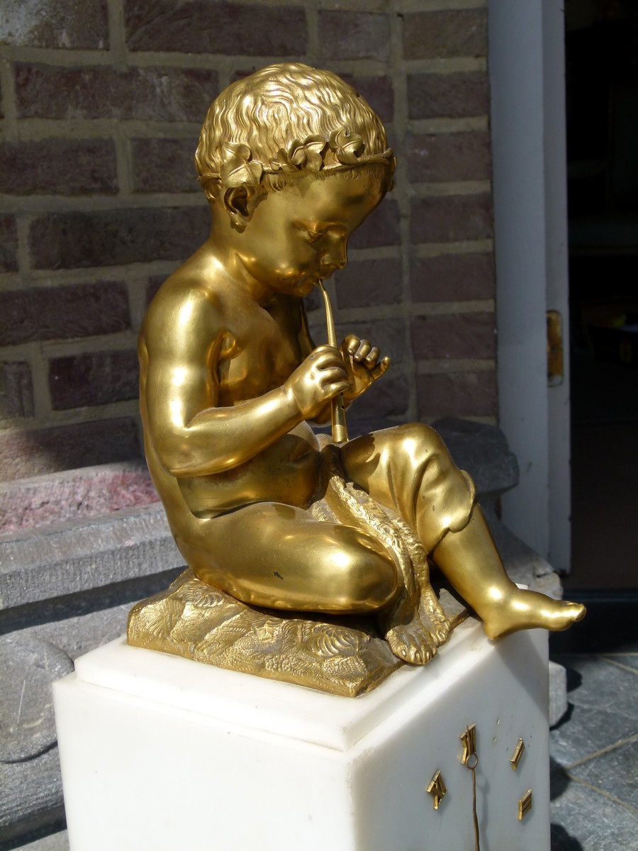 Charles X Clock with a putti playing on flutes