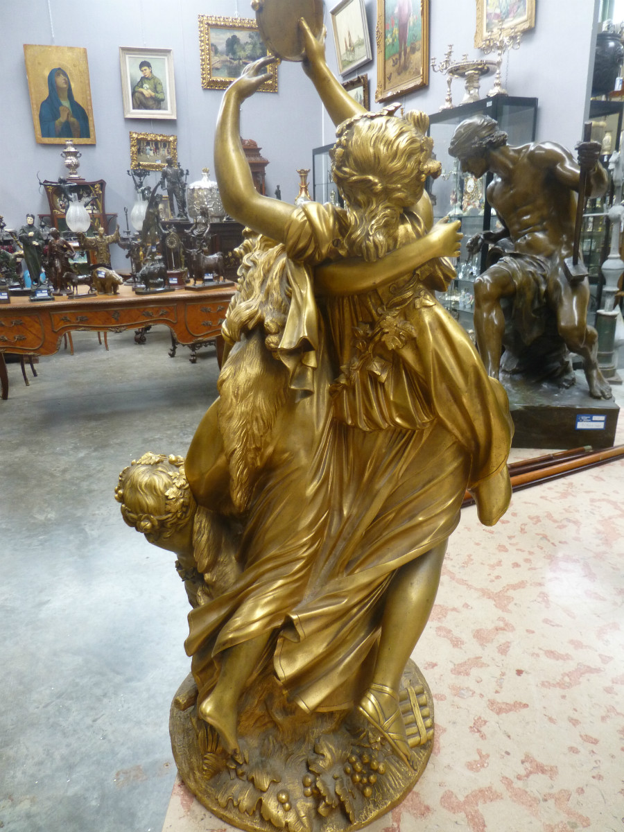 a magnificent gilded bronze sculpture by Clodion