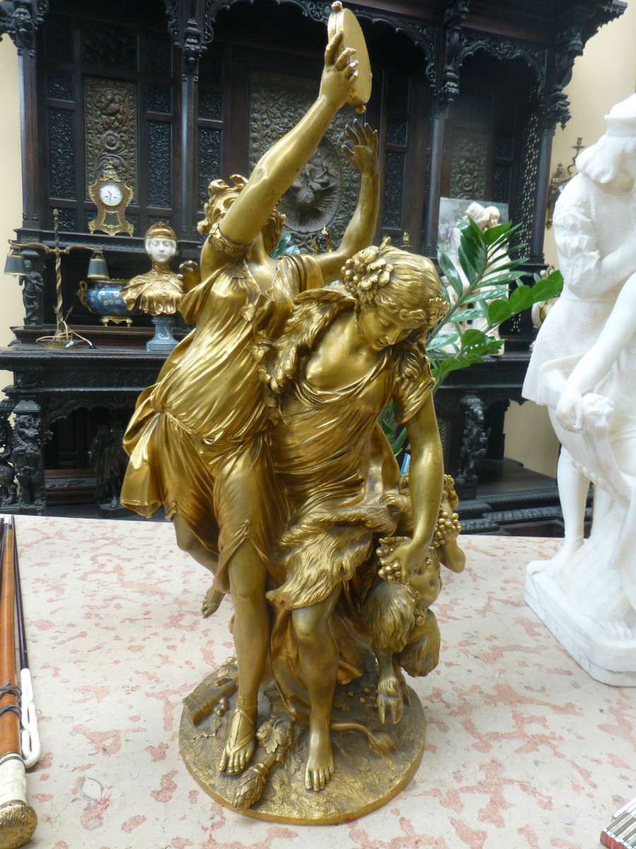a magnificent gilded bronze sculpture by Clodion